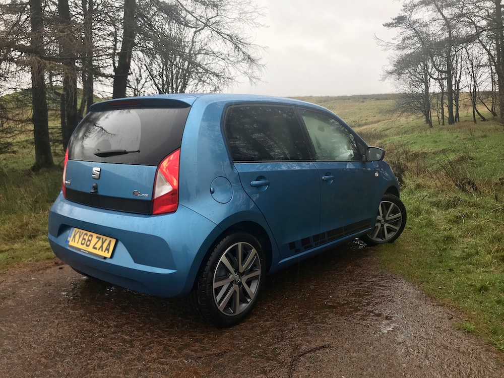 https://drivingtorque.com/wp-content/uploads/2018/12/Seat-Mii-Fr-line-rear-side-blue-review-roadtest.jpg