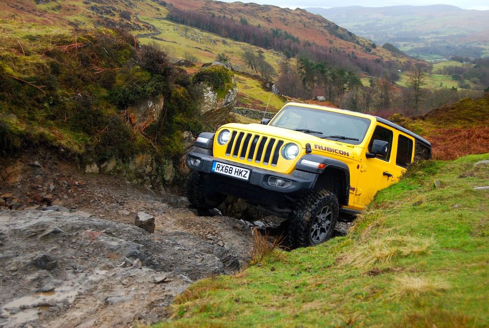 2019 jeep wrangler jl rubicon yellow front rock crawl