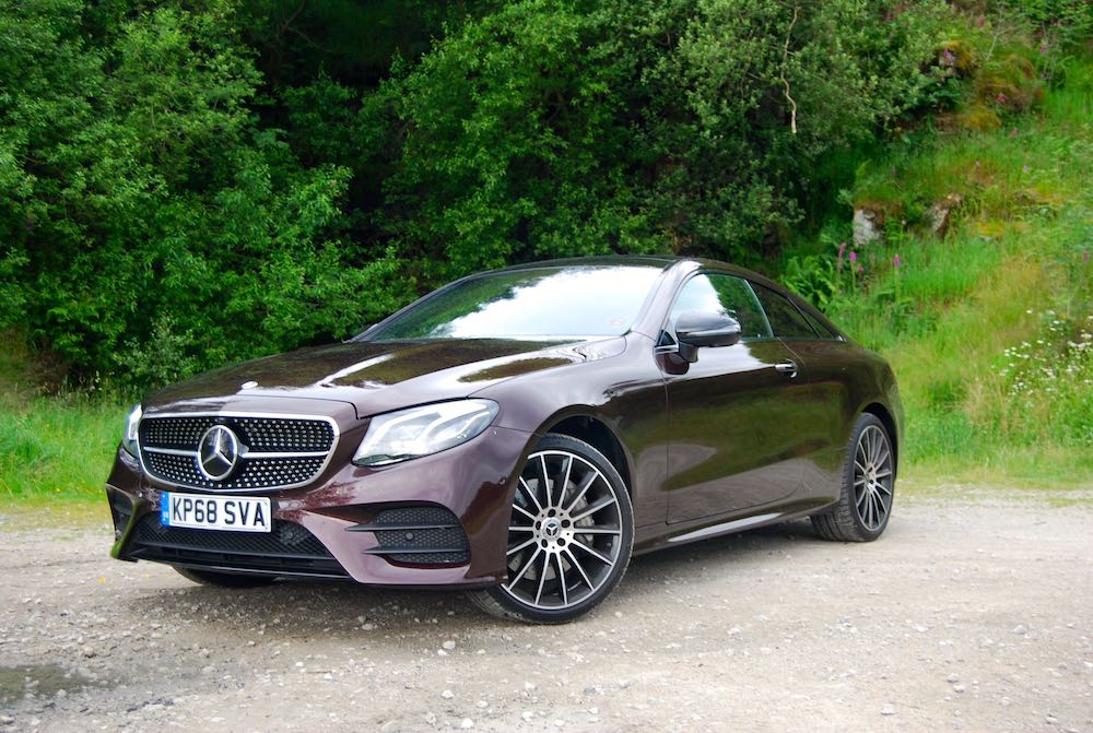 2019 mercedes benz e400d coupe red review roadtest side front